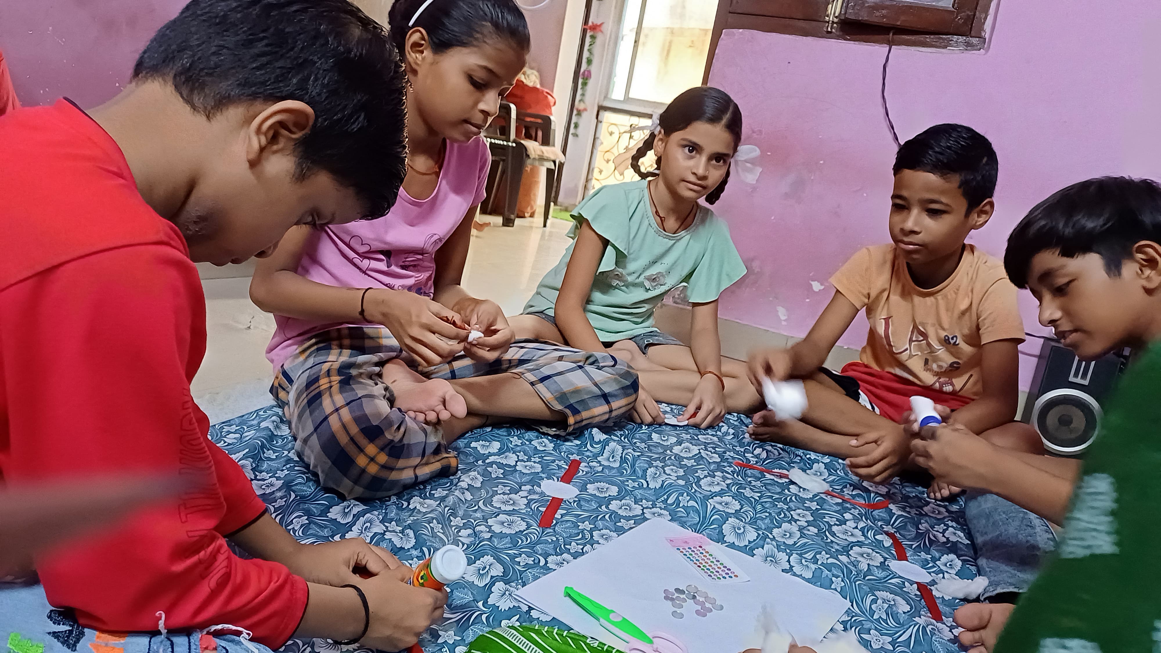 Children celebrating Raksha Bandhan with rakhis and smiles