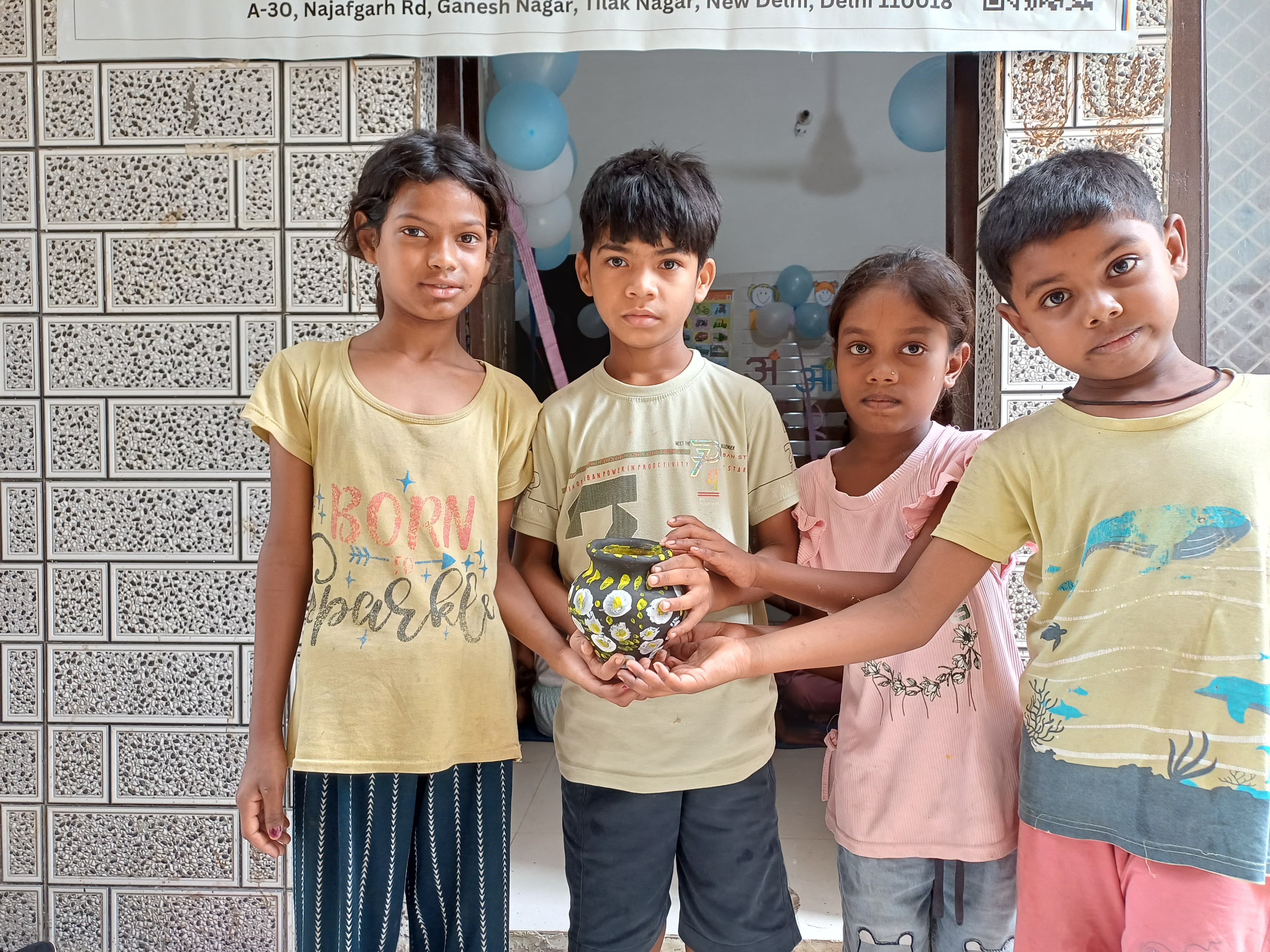 Children enjoying a community meal together